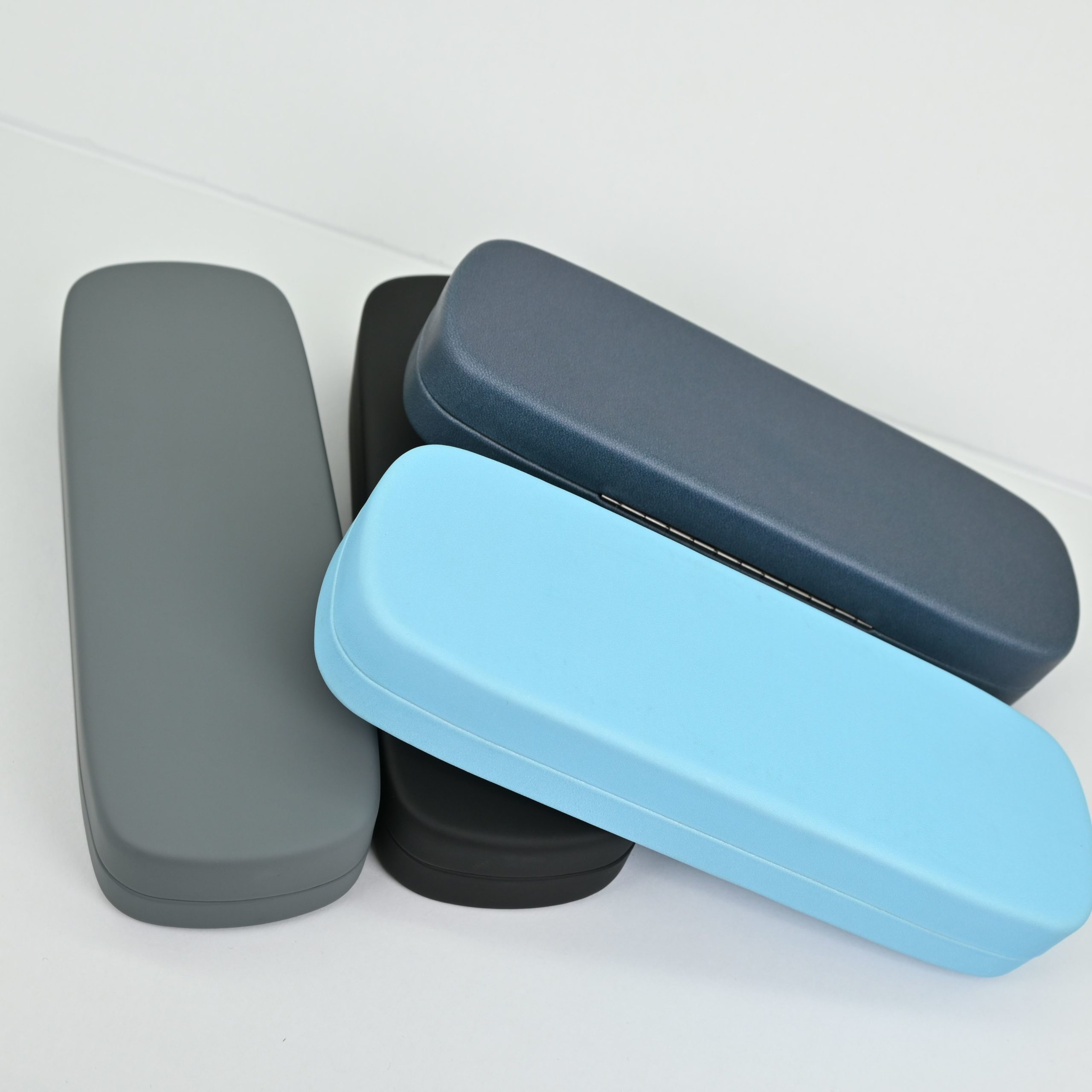 Peptide pen hard-shell carry cases in grey, navy, light blue and black